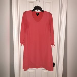 JM Collection Coral knee length lined dress w/ sheer overlay tied 3 qtr sleeve